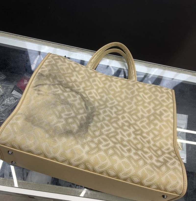 Stained purse before cleaning